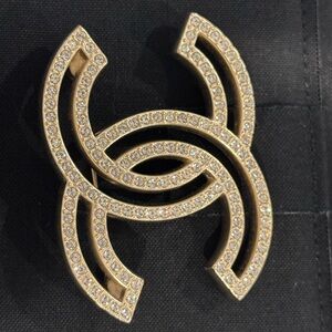 CHANEL Black and Gold Logo Brooch